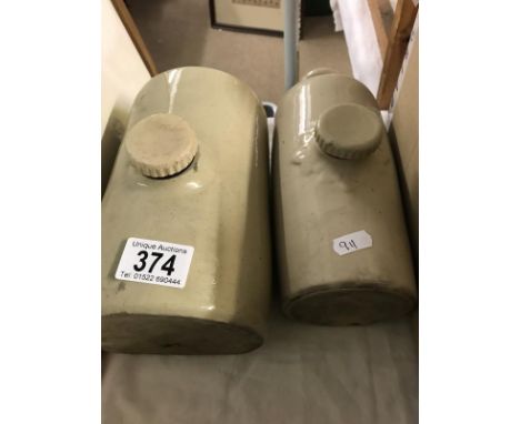 two ceramic hot water bottles