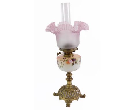 A Young's brass oil lamp, with an opaline glass reservoir painted with flowers, with chimney, and frosted to pink frilled gla