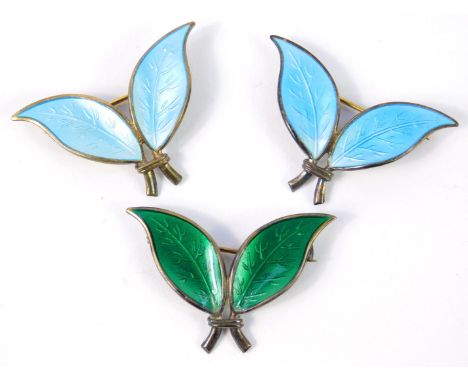 Three Willy Winnaess for David Anderson silver and enamel double leaf brooches, two in turquoise and one in green.