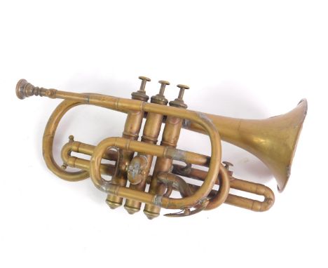 A Victorian brass cornet by Higham of Manchester, First Class Exhibition Prize medal, London 1862, and Dublin 1865, No 34365,