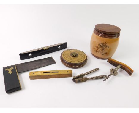 An ebony and brass carpenter's square, Rabone No 1623 spirit level, further spirit level, Dean's lawn tennis measure, a pair 