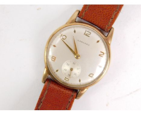 A Garrard gentleman's gold plated circular cased wristwatch, silvered dial bearing even Arabic numerals, subsidiary seconds d