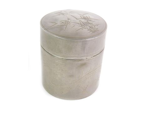 A Kuthing Swatow pewter tea caddy, engraved with a dragon and bamboo, with inner lid, impressed marks, 10.5cm high.
