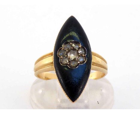 A Georgian gold, diamond and enamel dress ring, of navette form, with a central cluster of rose cuts, the bezel 22mm long, fi