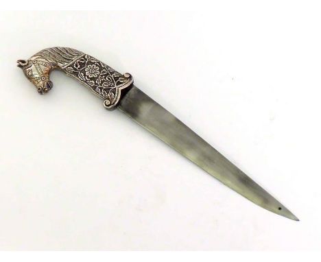 An Indian dagger with white metal (tests silver) handle chased with flowers and terminating in a bridled horse's head, probab