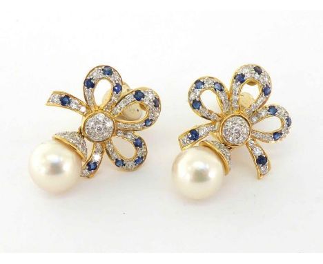 A pair of diamond, sapphire and cultured pearl ear clips, the bow top pave set with small brilliants and sapphires, the pearl