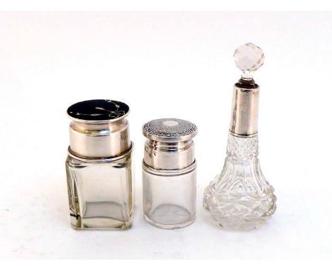 A silver-mounted glass smelling salts bottle with tortoiseshell top to cover inlaid with silver ribbon-tied foliage, Birmingh