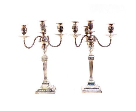 A pair of late Victorian silver four-light candelabra by Hawksworth, Eyre & Co. Ltd, Sheffield, 1894, in the Adam style, flut