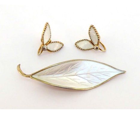 A mid 20th century Norwegian silver gilt and white enamel brooch by David Andersen, modelled as a leaf, impressed marks verso
