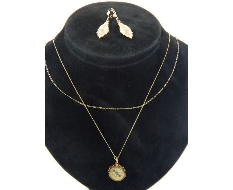 9ct gold St Christopher, a compass and chain, and a pair of 9ct gold earrings 