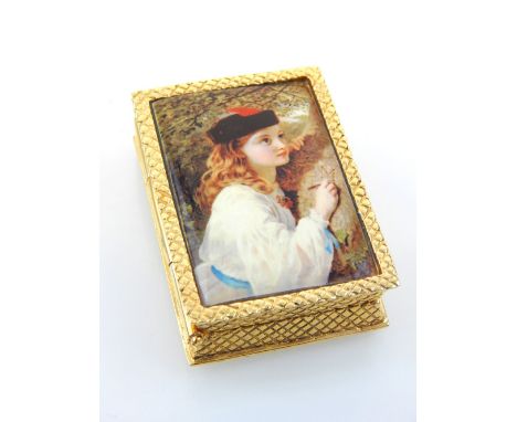 Gold plated pill box, the lid with enamel plaque depicting a young girl carving her letters into a tree, 5cm w