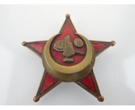 Ottoman Empire Gallipoli Star, c.1916, military award to Turkish troops, brass star with crescent and date, red guilloche ena