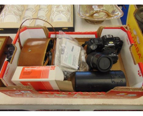 A qty of camera lenses, binoculars etc.