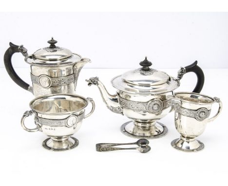 An early 20th Century four piece Irish silver tea service by Reid &amp; Sons of Newcastle, comprising teapot, hot water pot a