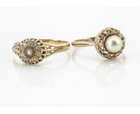 A pearl and diamond cluster ring, the worn 18ct gold setting and shank having claw set old cut diamonds and a heavily worn pe