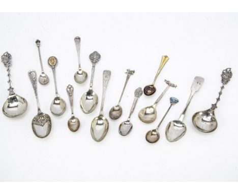 A collection of silver teaspoons and coffee spoons, including a silver gilt and enamel coffee spoon by David Andersen, 7.7 oz