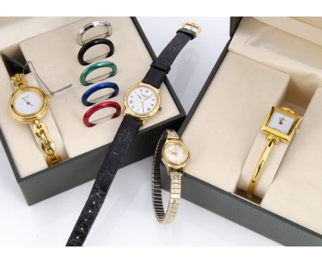Four ladies wristwatches, including a gilt Raymond Weil on black leather strap in in black pouch, two boxed Gucci examples, o