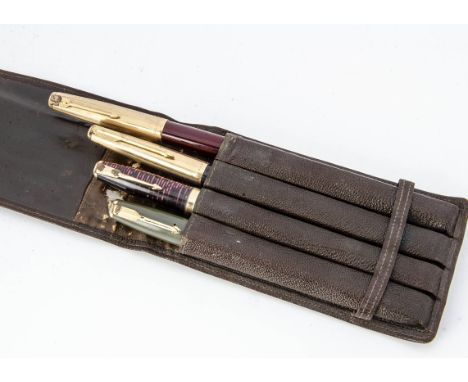 Four vintage fountain pens, including a Parker Duofold, a Parker Vacumatic, a Parker 61, and probably a Parker 71, presented 
