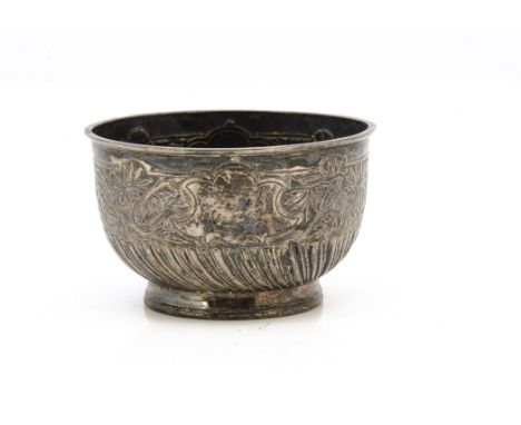 A Victorian silver sugar basin by Edward Hutton, circular footed bowl with raised design, 4.1 ozt, 10cm diameter, London 1881