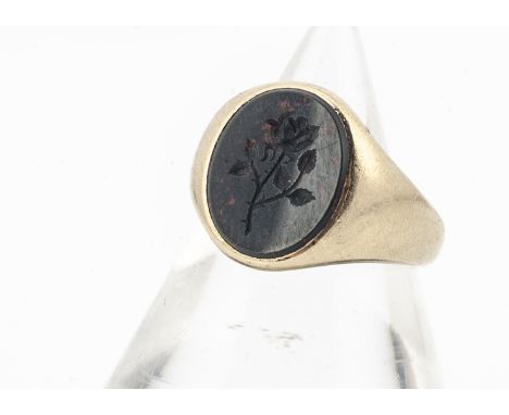A 9ct gold lady's signet ring, with bloodstone seal with rose, ring size H, 5.7g 