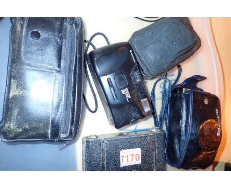 Olympus Trip 35 and AF Plus other 35mm cameras with Kodak folding camera 
