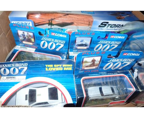 Six James Bond 007 Corgi cars boxed helicopter and electronic radio set boxed 