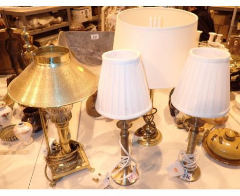 Four brass table lamps one Oriental express reproduction   CONDITION REPORT: All electrical items in this lot have been PAT t