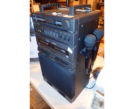 Televideo karaoke machine with dual microphones  CONDITION REPORT: All electrical items in this lot have been PAT tested for 