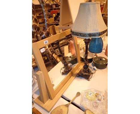 Contemporary pine dressing table mirror with Victorian type table lamp 