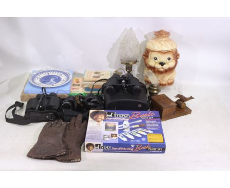 Three binoculars with their cases/bags to include Ranger Revue, Halina Discovery, Miranda. A wooden carved cigarette dispense