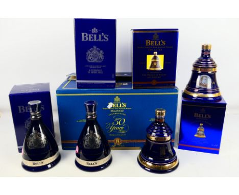 Four Bells Scotch Whisky decanters comprising two Diamond Jubilee examples, an 8 Year Old Christmas 2004 and a Prince Of Wale