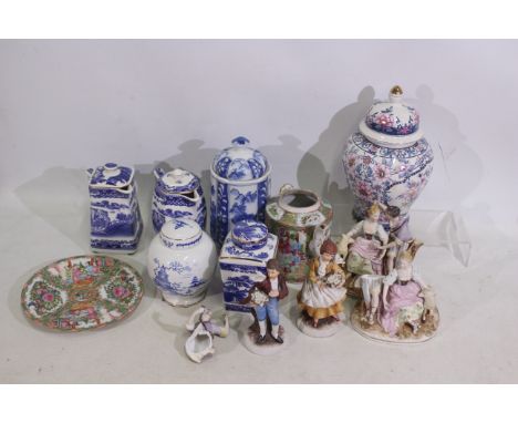 Mixed ceramics to include Chinese plate and teapot, Wade Ringtons blue and white, continental figures and other. [W]

NOTE: T
