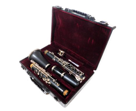 A Blessing clarinet, serial number D1433, cased. 
