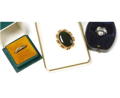 A 9ct gold wedding band, with engraved decoration, size I½, 1.6g, together with an oval jade brooch in a 14ct plated mount, a