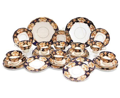 A Royal Albert porcelain Heirloom pattern part tea service, comprising pair of bread plates, eight teacups, saucers, and tea 