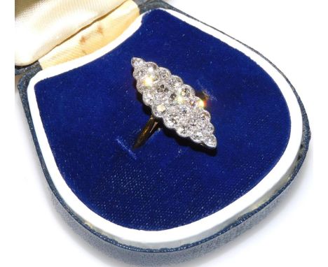 An early 20thC 18ct gold and diamond marquise ring, set with twenty-one graduated rose cut diamonds, the ring measures 2.7cm 