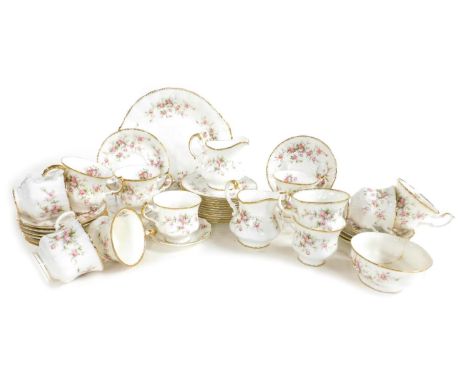 A Paragon porcelain Victoriana Rose pattern tea service, comprising bread plate, pair of cream jugs, sugar bowl, eleven teacu