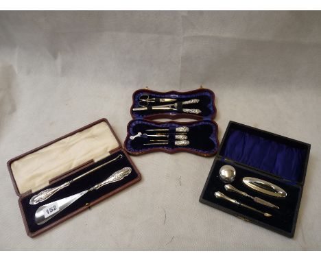 Edwardian Silver handled ladies sewing set, Cased Nail set with Silver handles and a Silver handled Shoe horn and button hook