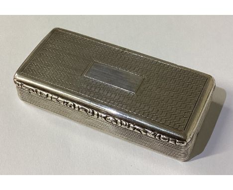 An engine turned William IV silver snuff box. Birmingham 1827. By William Sumner. Approx. 70 grams. Est. £120 - £150.