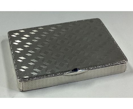 A good quality engine turned silver snuff box of stylised form. Approx. 83 grams. Est. £80 - £120.