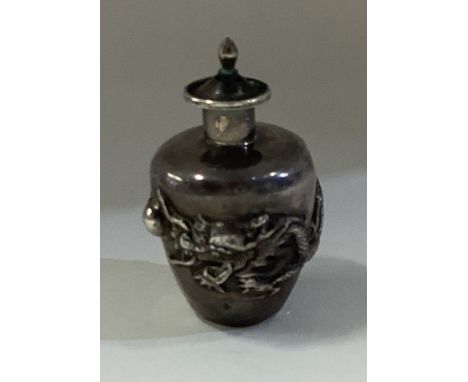 A miniature Chinese silver tea caddy. Marked to base. Approx. 21 grams. Est. £40 - £60.