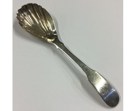 DUBLIN: A large Irish silver caddy spoon with fluted decoration. 1808. Approx. 22 grams. Est. £40 - £60.