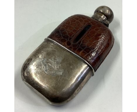 A silver and crocodile skin flask. London 1895. Approx. 294 grams. Est. £100 - £150.