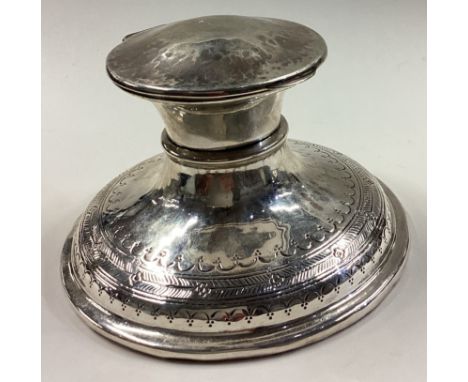 An Arts and Crafts silver inkwell in the style of Liberty &amp; Co. Circa 1910. Approx. 418 grams of gross weight. Est. £100 