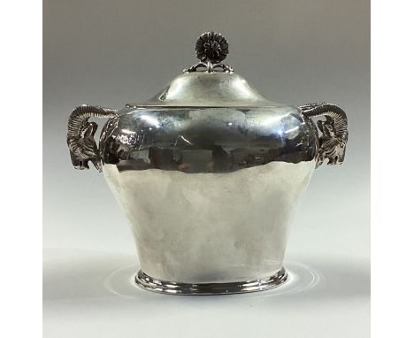 An unusual silver tea caddy cast with figural ram head handles. Fully marked to cover and body. London 1905. By S & Co. Appro