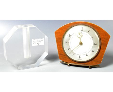 A retro vintage 1940's Art Deco Metamec mantle / desk clock having a two tone dial with faceted hands along with a clear pers