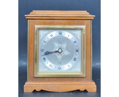 A 20th Century Elliott mantel clock, dial marked Garrard &amp; Co. Ltd., 112 Regent Street, London, having a silvered dial wi