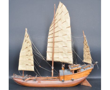 A vintage 20th century Scratch built model of a&nbsp;Chinese oriental &nbsp;boat /&nbsp;sampans. The large boat having three 