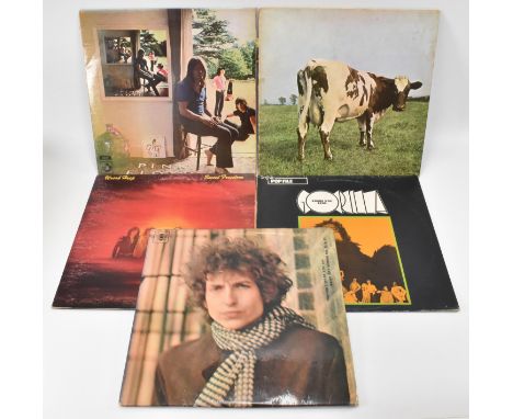 A collection of six vintage 20th century 12” vinyl records. The collection comprising of Bob Dylan, Gorilla, Uriah Heep, Pink