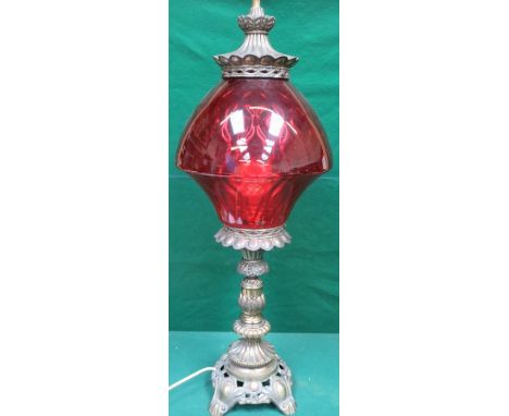 DECORATIVE CAST METAL TABLE LAMP WITH RUBY COLOURED GLASS SHADE